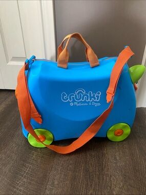 Trunki Ride-On Suitcase by Melissa & Doug — Bright Blue with Orange Straps